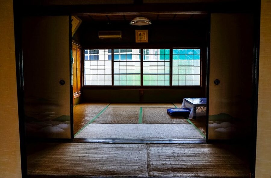 Tatami room with shoji screens in a Japanese ryokan
