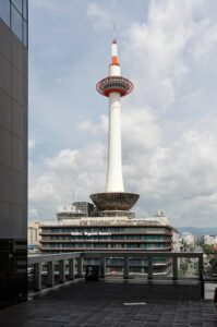 Kyoto Tower as seen from the front of Kyoto Station