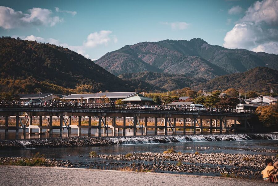 Togetsukyo bridge in autumn with maple colours