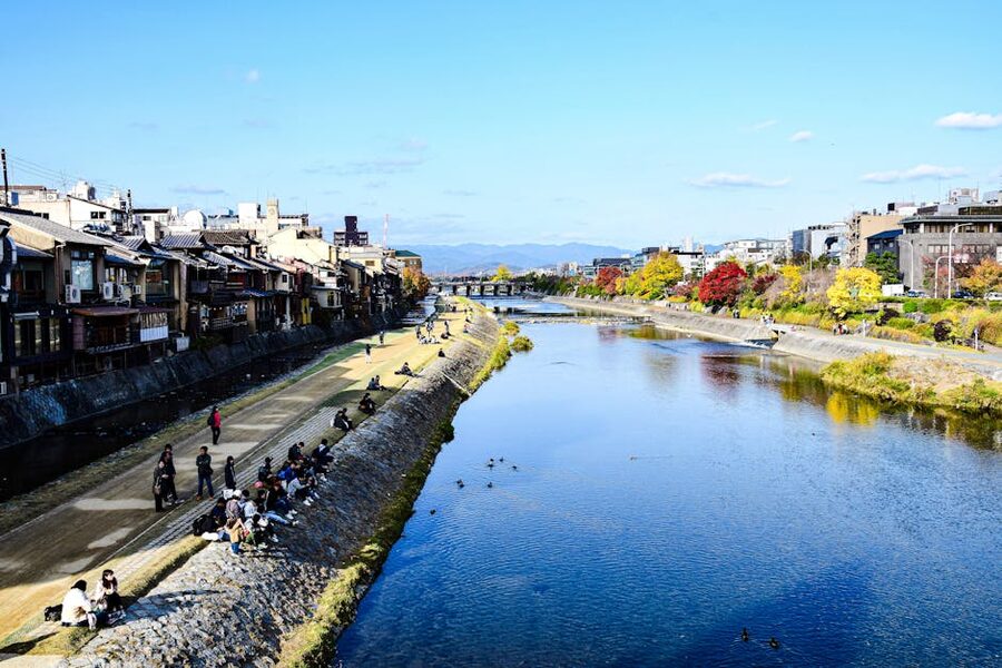 Kamo River with traditional houses in autumn