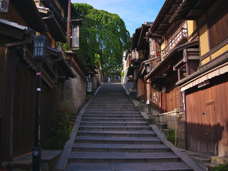 Sannenzaka stone steps in Higashiyama with traditional wooden buildings and lanterns