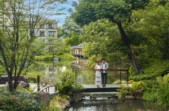 Four Seasons Hotel Kyoto exterior with the Shakusui-en pond garden in the foreground, Higashiyama