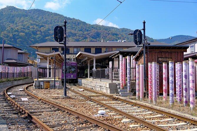 Explore Arashiyama Bamboo Forest with Authentic Zen Experience - The descent to Kimono Forest and the Randen station