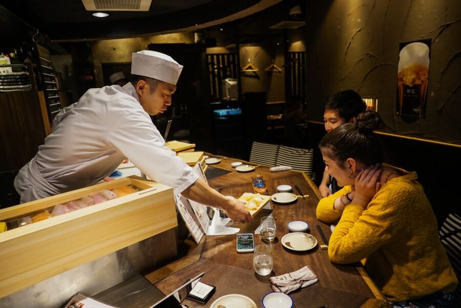 Kyoto: 3-Hour Night Foodie Tour in Gion - Walking through Pontocho between dinner stops
