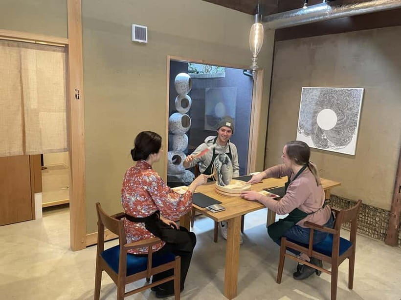 Kyoto: Authentic Sushi Making Cooking Lesson - Shaping nigiri with fresh local fish
