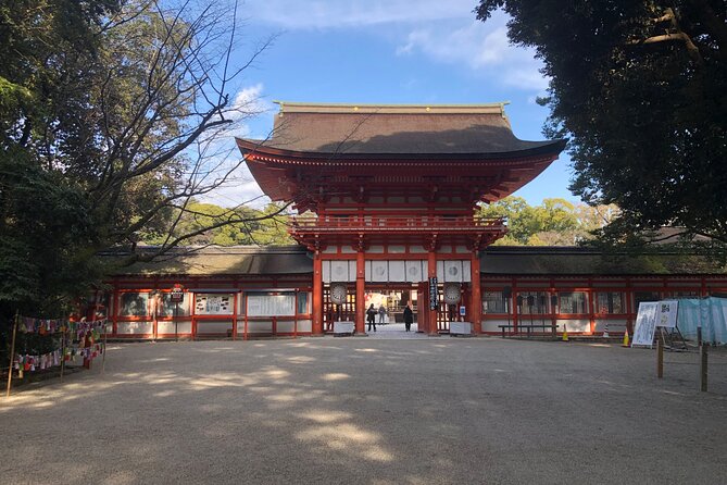 Kyoto Bamboo Forest & Golden Pavilion E-Bike Tour - Walking through Arashiyama Bamboo Forest