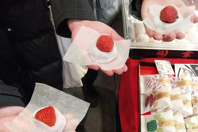 Kyoto Food Tour of 10 Tastings with Wagyu, Mochi & More Surprises - Meeting beneath the orange umbrella