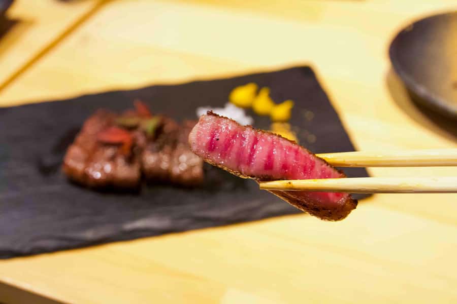 Kyoto: Hidden Gem Food Tour in Fushimi - Izakaya-style meats and regional dishes broaden the menu