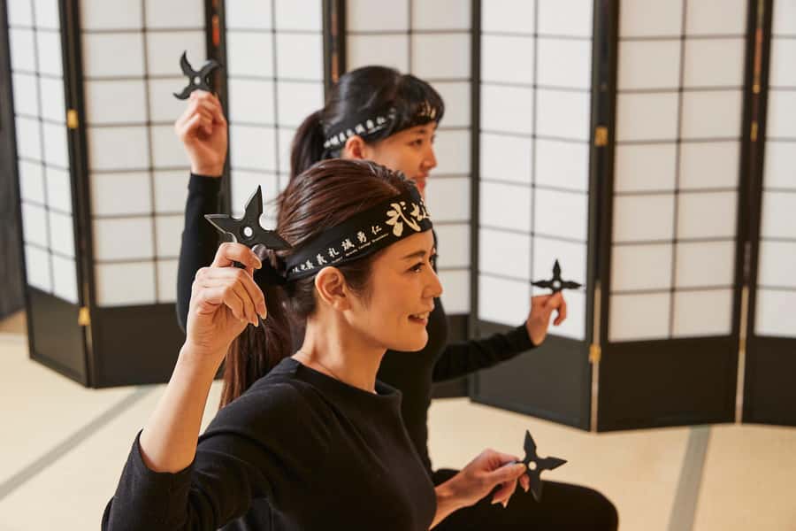 Kyoto : Kid-Friendly Ninja Class at the Samurai Ninja Museum - Putting on the ninja outfit in central Kyoto