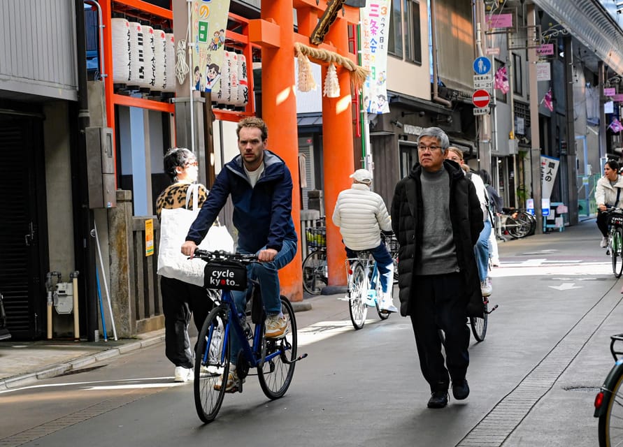 Kyoto: North Kyoto Guided Cycling Tour with Lunch - Crossing the Kamo River before returning