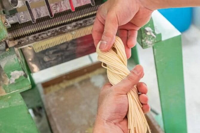 Kyoto Ramen Noodle Making Class - Mixing flour and building the dough