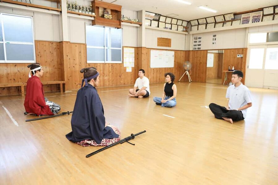 Kyoto : Samurai Sword Experience at Myokaku-ji Temple - Learning to wear a traditional kimono