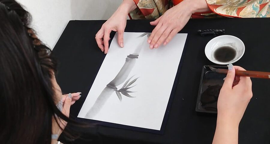 Kyoto: Sumi Ink and Brush Calligraphy Experience - Painting bamboo on a shikishi board