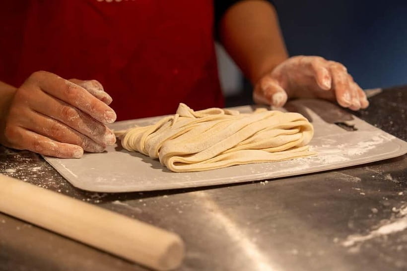 Kyoto Udon & Tempura Cooking Class with Professional Chefs - Frying tempura in a small class