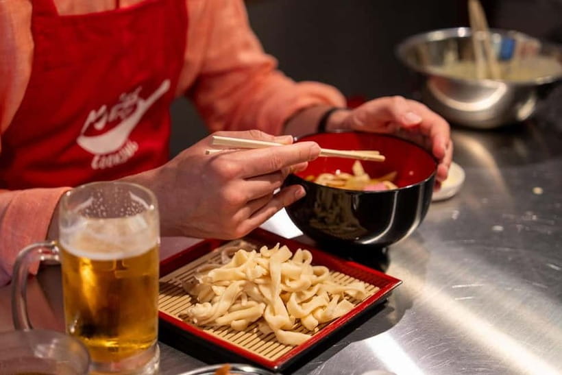 Kyoto Udon & Tempura Cooking Class with Professional Chefs - Eating what you made, with two drinks
