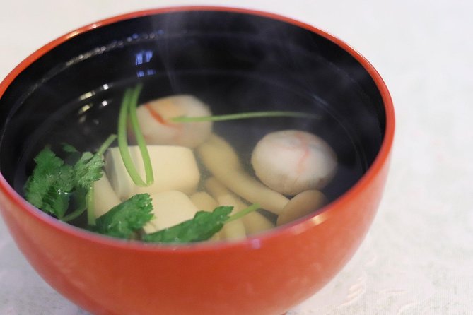 Private Japanese Home Cooking Class in Kyoto with Michiyo - Sitting down for a meal with the hosts