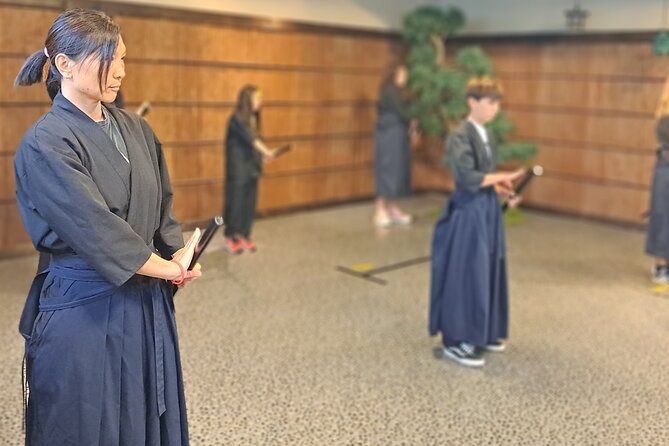 Samurai Sword Experience (Family Friendly)at SAMURAI MUSEUM KYOTO - Putting on the armor at Kyoto Samurai Ninja Museum