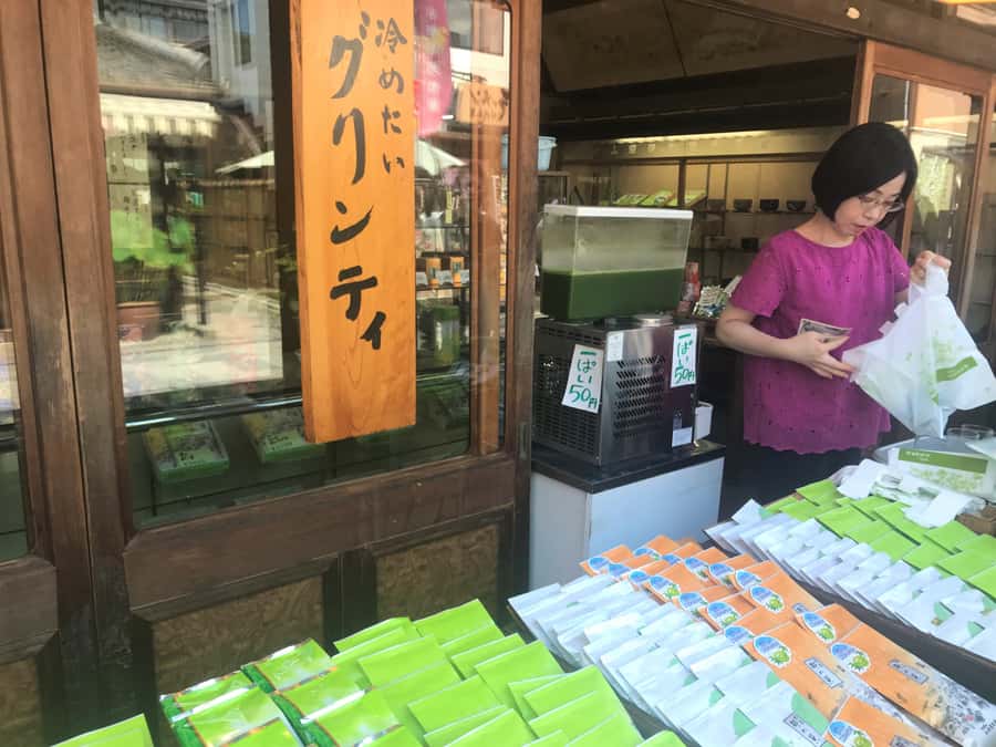 Uji: Green Tea Tour with Byodoin and Koshoji Temple Visits - Crossing the Uji River toward Byodoin